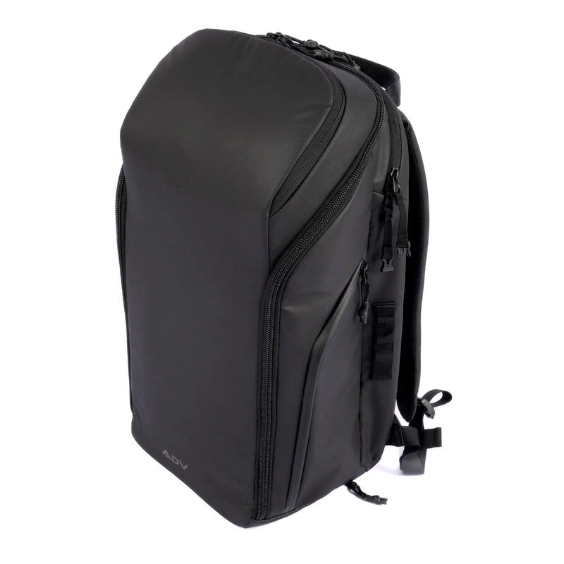 Tournament tennis bag in sleek black design with multiple zippered compartments and padded shoulder straps for easy carrying.