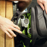 Tennis and pickleball bag with multiple racquet compartments shown open, revealing padded interior and organized racquet storage.