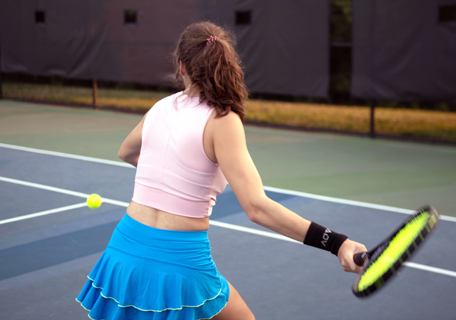 tennis wristbands shown on a female arm
