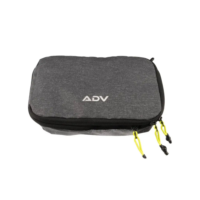 Tennis accessories pouch in gray fabric with dual zippers and yellow pull cords for organizing gear and essentials.